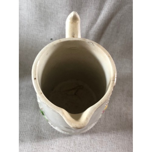 506 - Staffordshire pottery milk jug with raised molding in a nautical theme