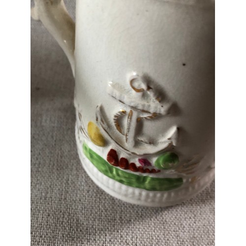 506 - Staffordshire pottery milk jug with raised molding in a nautical theme