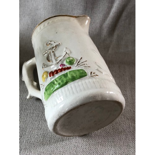 506 - Staffordshire pottery milk jug with raised molding in a nautical theme