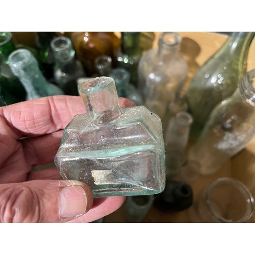 658 - Collection of old glass bottles along with perfume bottles. Some named