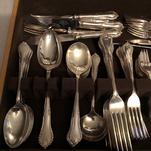 1148 - Comprehensive Walker and Hall silver plated cutlery set boxed in a solid blond Oak case