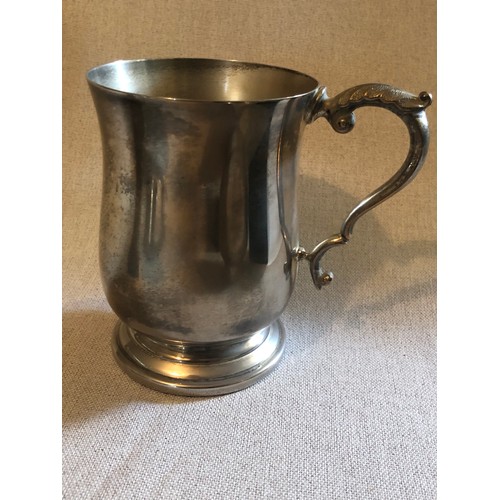 1151 - Silver plated tankard.