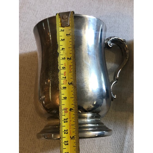 1151 - Silver plated tankard.