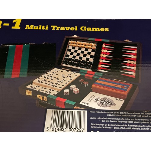 1438 - Six in one multi travel set. drafts, chess, backgammon dominoes cards cribbage checkers.