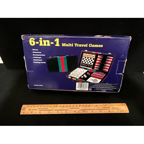 1438 - Six in one multi travel set. drafts, chess, backgammon dominoes cards cribbage checkers.