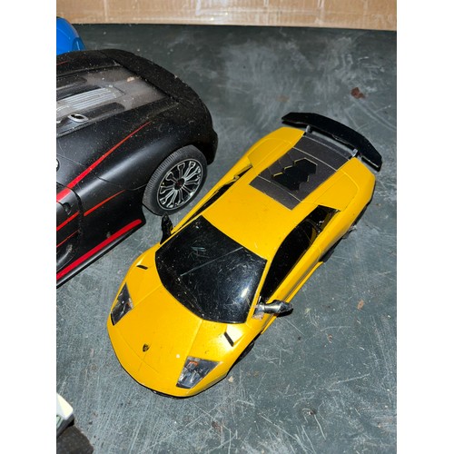 1439 - Box of sports car toys, along with a robot