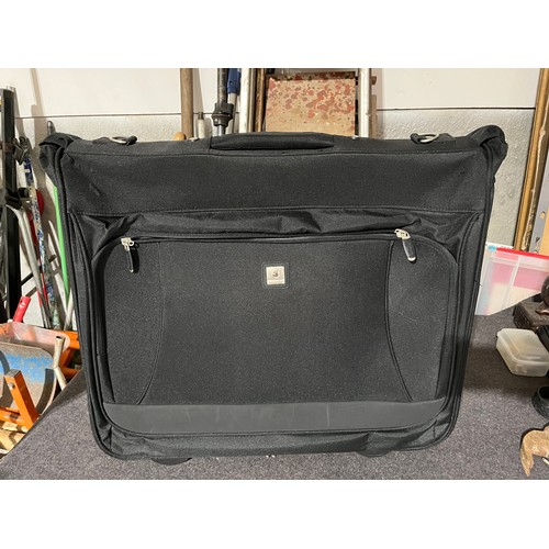 1491 - Carry case with wheels. Ideal for suits