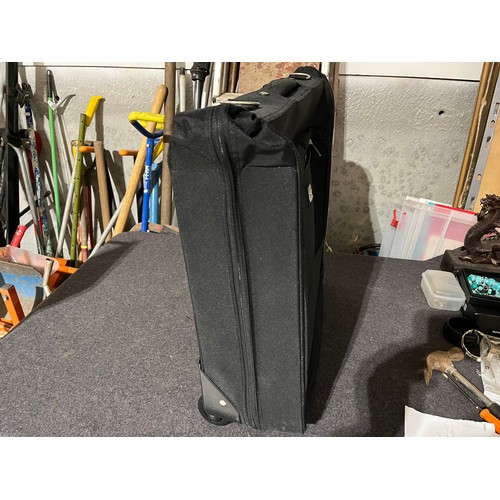 1491 - Carry case with wheels. Ideal for suits