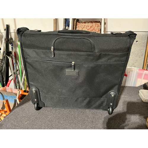 1491 - Carry case with wheels. Ideal for suits