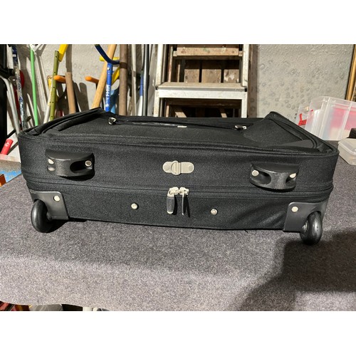 1491 - Carry case with wheels. Ideal for suits