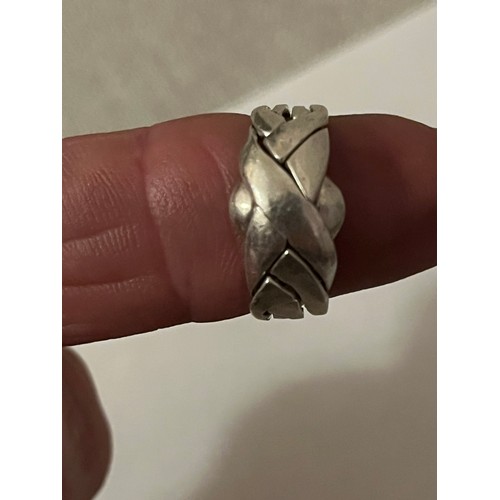 7 - 4 band silver  .925 puzzle ring. Size M