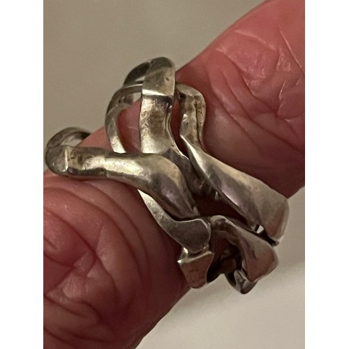 7 - 4 band silver  .925 puzzle ring. Size M