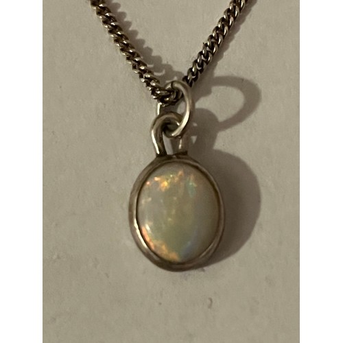 10 - Silver bound fire Opal pendant hallmarked on silver chain .925