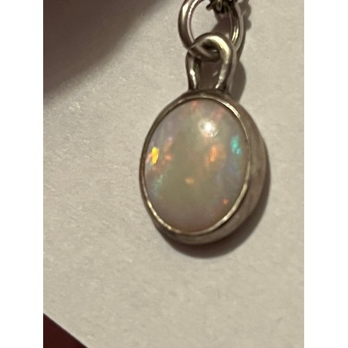 10 - Silver bound fire Opal pendant hallmarked on silver chain .925