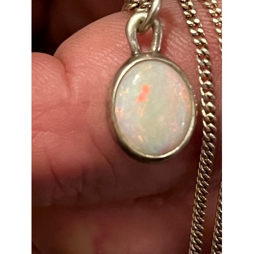 10 - Silver bound fire Opal pendant hallmarked on silver chain .925