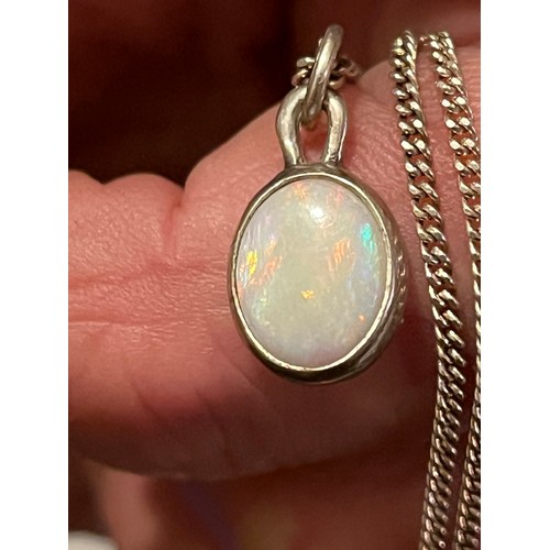 10 - Silver bound fire Opal pendant hallmarked on silver chain .925