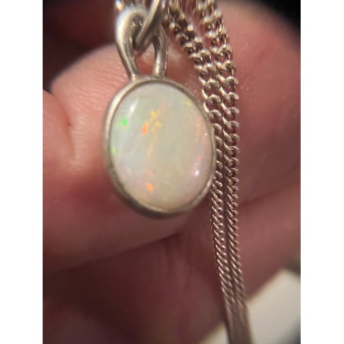 10 - Silver bound fire Opal pendant hallmarked on silver chain .925