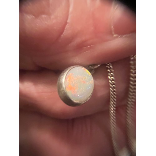 10 - Silver bound fire Opal pendant hallmarked on silver chain .925