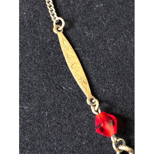 60 - 1920's Edwardian silver plated chain with a bright vermilion red crystal paste briolette suspended f... 