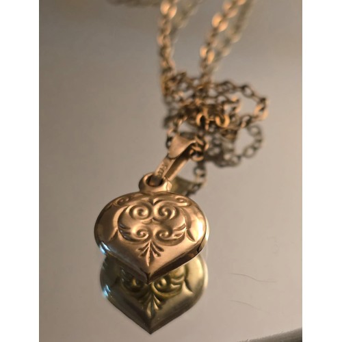 118 - 9ct gold necklace and heart 9ct pendant. 1.05 grams