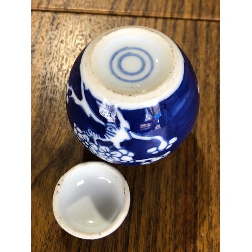 273 - Oriental Japanese cherry blossom, prunus blue and white lidded jar with blue circles under