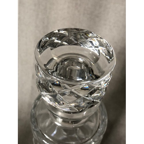 333 - Cylindrical crystal decanter with criss-cross pattern.