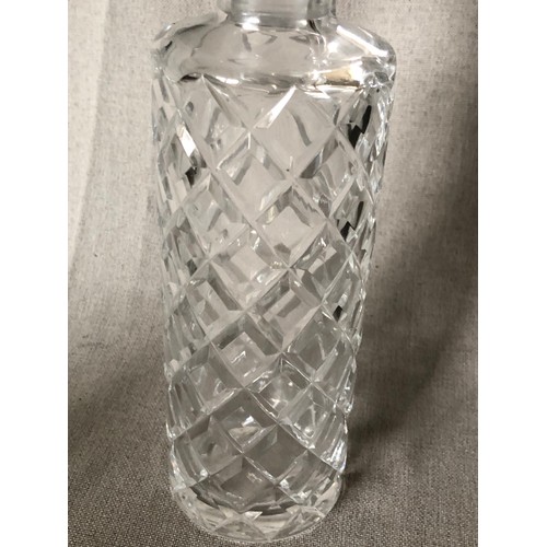 333 - Cylindrical crystal decanter with criss-cross pattern.