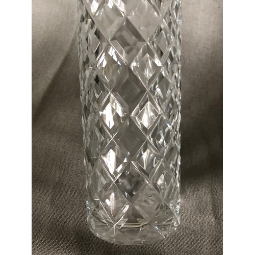 333 - Cylindrical crystal decanter with criss-cross pattern.