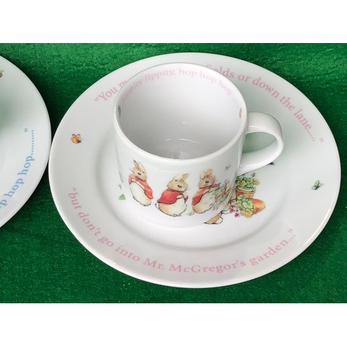 376 - Boys and Girls Peter Rabbit mugs & plates by Wedgwood.