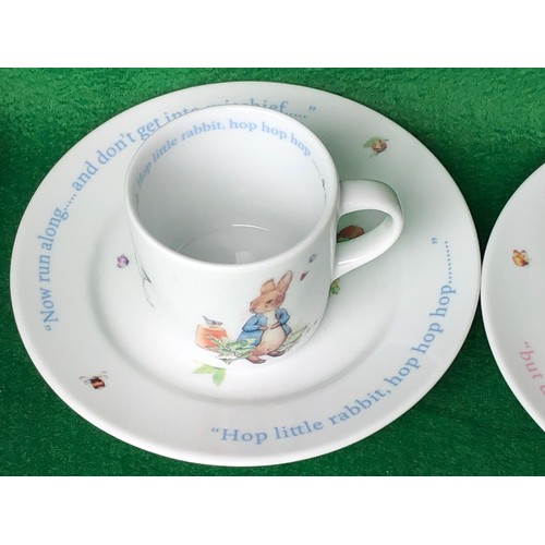 376 - Boys and Girls Peter Rabbit mugs & plates by Wedgwood.