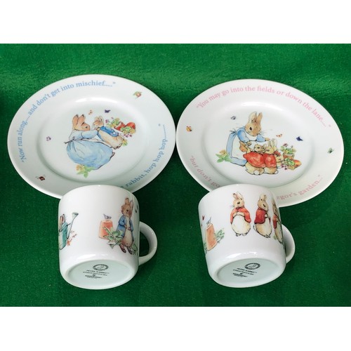 376 - Boys and Girls Peter Rabbit mugs & plates by Wedgwood.