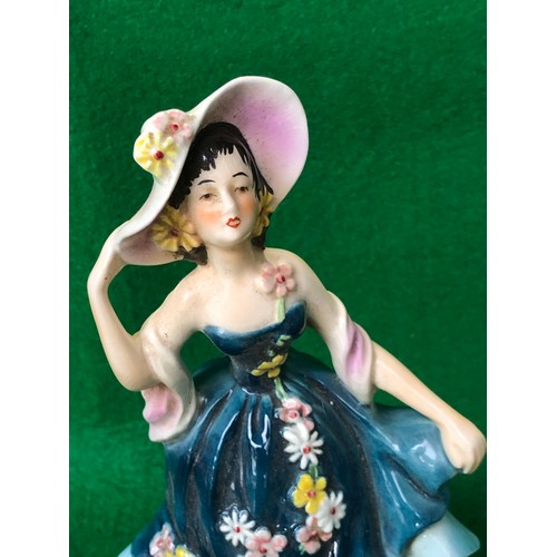 381 - Goebel figurine Of lady with hat.