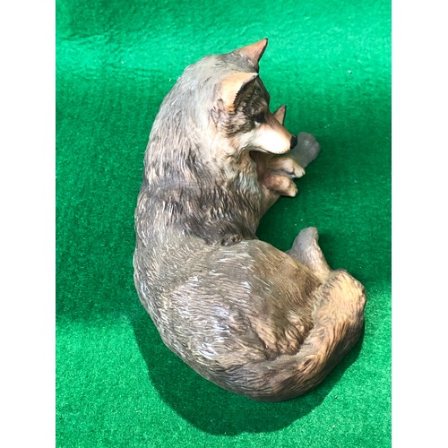 382 - Woodland repose by Nicholas Wilson. 1985 FP. Figure of a wolf with cub