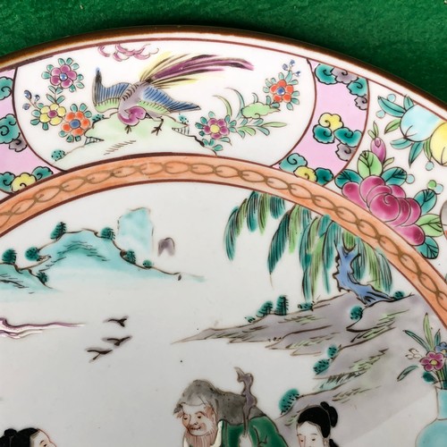 390 - A large Japanese hand painted charger plate. Impressed and Signed.