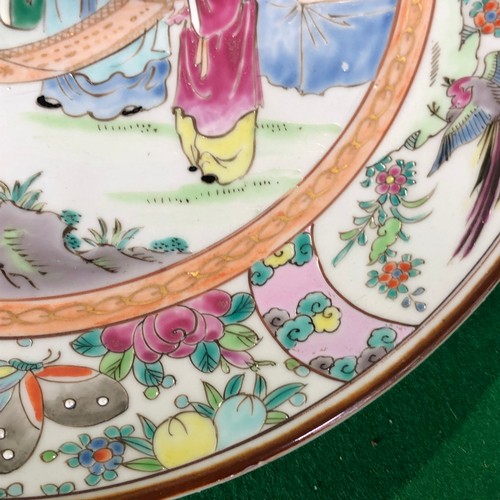 390 - A large Japanese hand painted charger plate. Impressed and Signed.