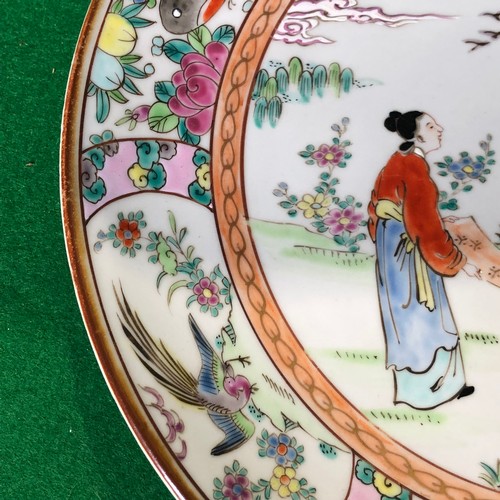 390 - A large Japanese hand painted charger plate. Impressed and Signed.