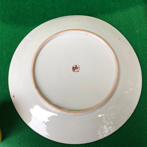 390 - A large Japanese hand painted charger plate. Impressed and Signed.