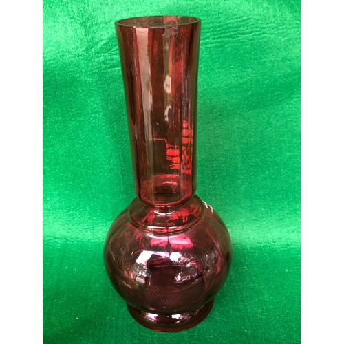 402 - Cranberry glass vase decorated in lily-of-the-valley white enamel.