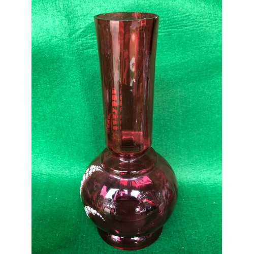 402 - Cranberry glass vase decorated in lily-of-the-valley white enamel.