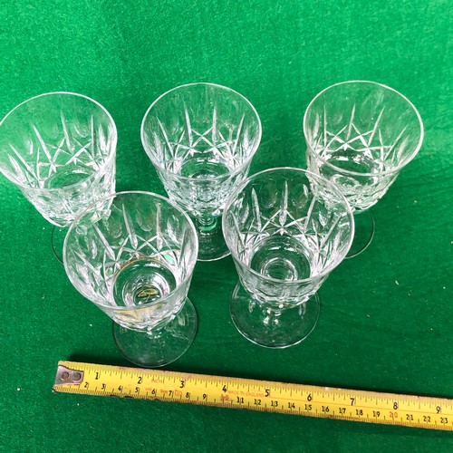 409 - Five Thomas Webb wine glasses.