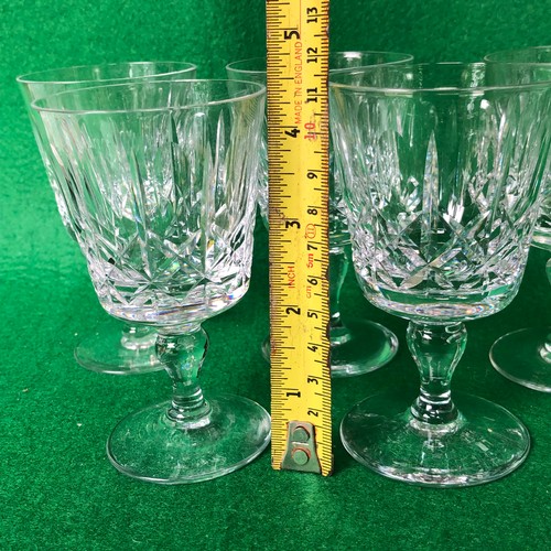 409 - Five Thomas Webb wine glasses.