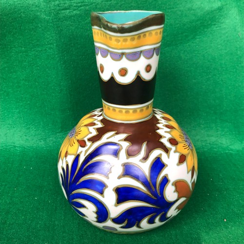 415 - A large Gouda jug in dahlia pattern