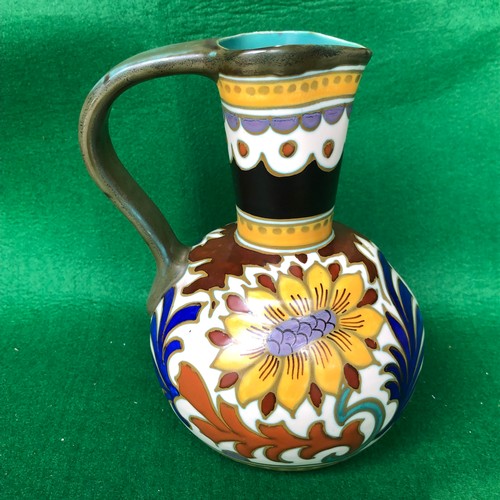 415 - A large Gouda jug in dahlia pattern