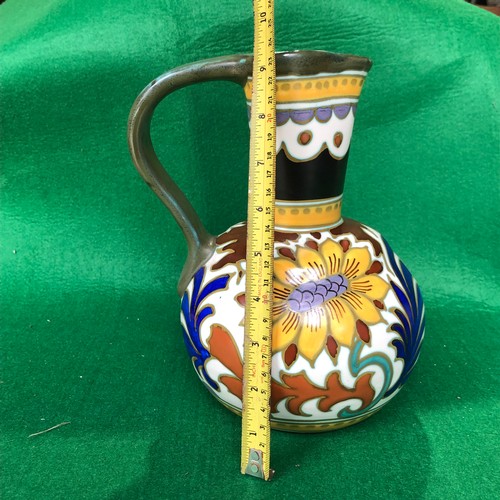 415 - A large Gouda jug in dahlia pattern