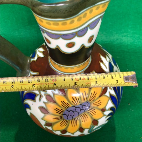 415 - A large Gouda jug in dahlia pattern