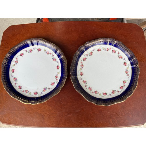 483 - Pair of Wedgwood antique plates in gold and colbalt blue with floral pattern