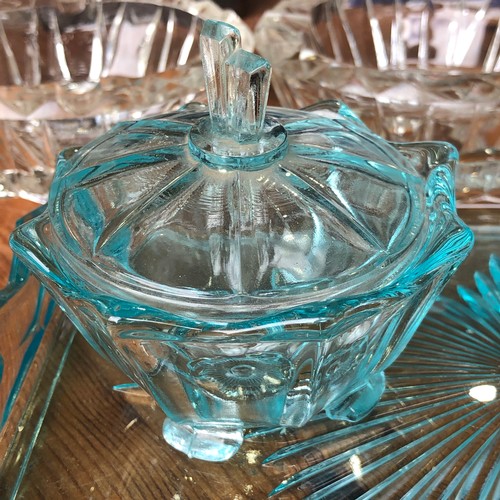 549 - Art deco pressed glass to include a blue dressing table set.