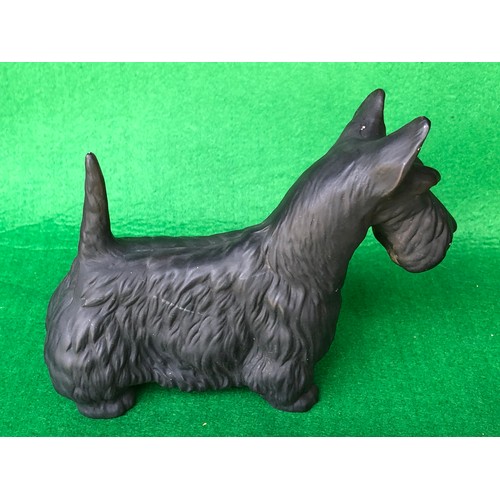 572 - Ceramic dog figurine