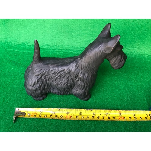 572 - Ceramic dog figurine