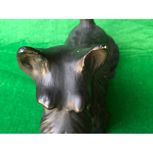 572 - Ceramic dog figurine